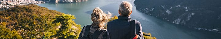 Older couple looking out over the mountains