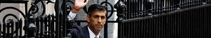 Sunak waving from Number 10 Downing Street