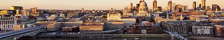 Sun setting over London city and Thames