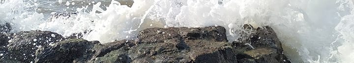 Waves crashing into rocks