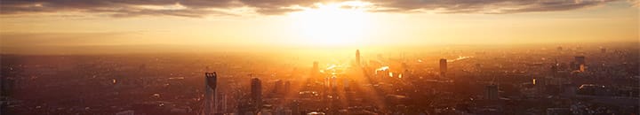 Sunset over city landscape