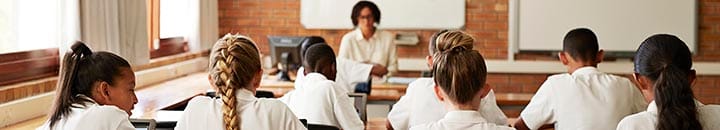 School students in class working with tablets