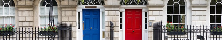 Front doors of a row of terraced houses