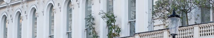 Close up of windows and balconies on terraced houses in London