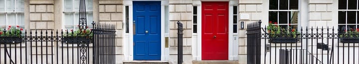 red and blue doors on houses