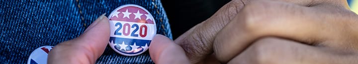 2020 US election pin badge on jacket