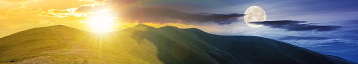 Sunset over hills blended with hills at moon light