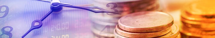 stock exchange rates alongside clock and coins