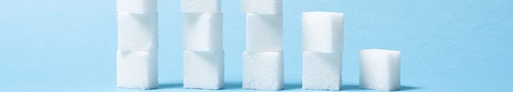 Sugar cubes stacked on top of each other in columns