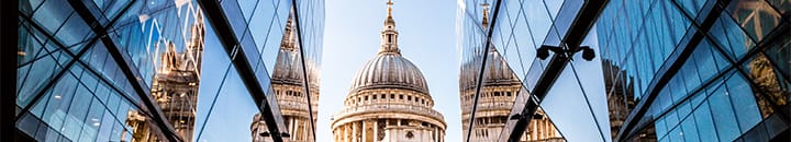 St. Pauls reflecting in glass office buildings