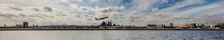 London City Airport with plane taking off