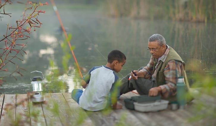 Grandfather and son fishing