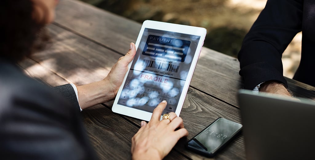 Woman working on her tablet device