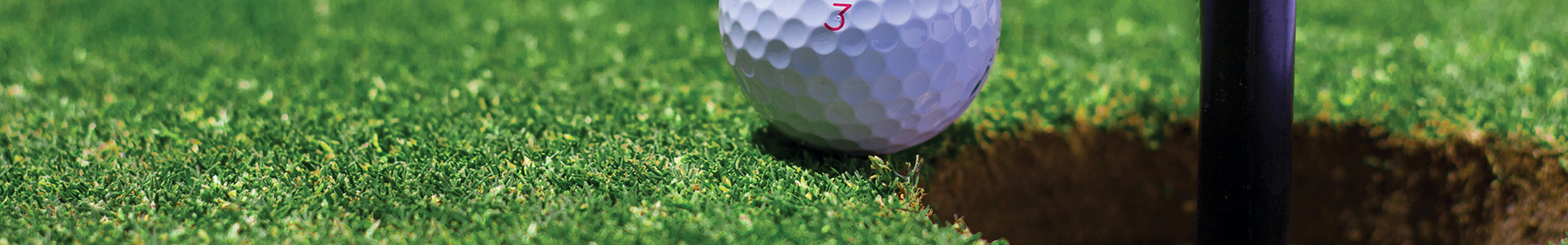 Golf ball near hole
