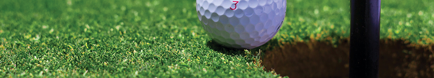 Golf ball near hole