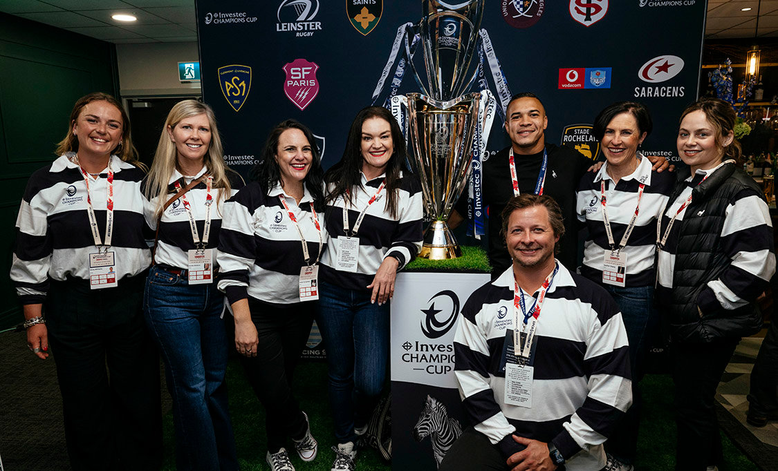 Team Investec with Cheslin Kolbe and the trophy