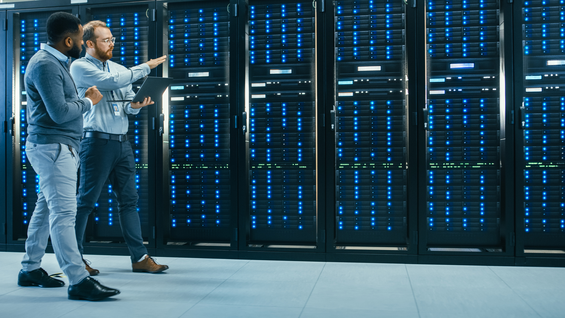 Men walking in a data centre