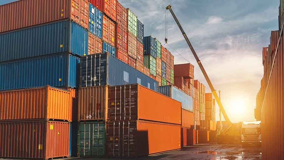The container yard and dock, a symphony of industry and logistics. Here, stacks of containers, like colorful building blocks, await their journey across the seas. Cranes and machinery orchestrate the ballet of loading and unloading, ensuring the constant flow of global trade. This is where goods begin their voyage, and the world stays connected.
