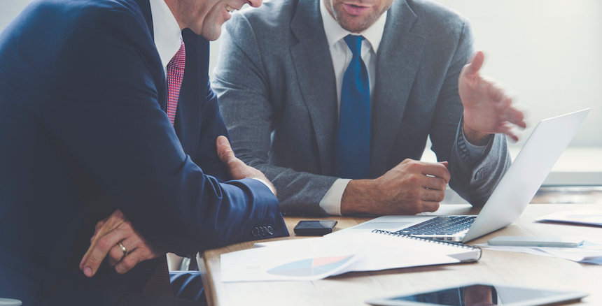 Professionals discussing finance