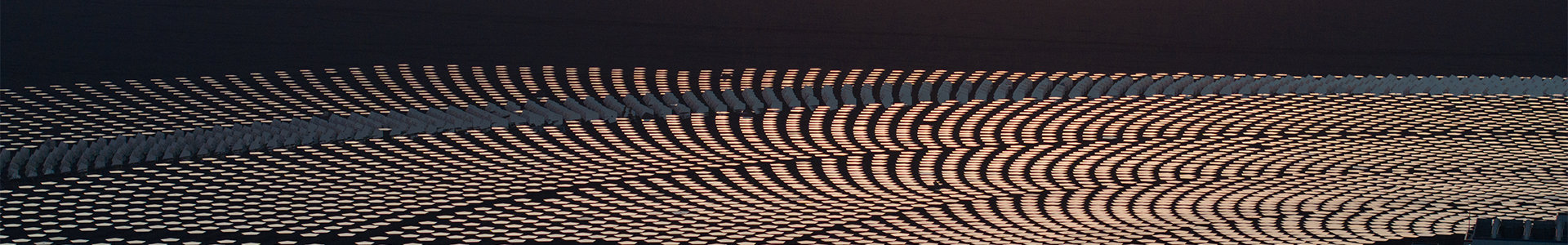 solar panels with wind turbines in desert in Africa