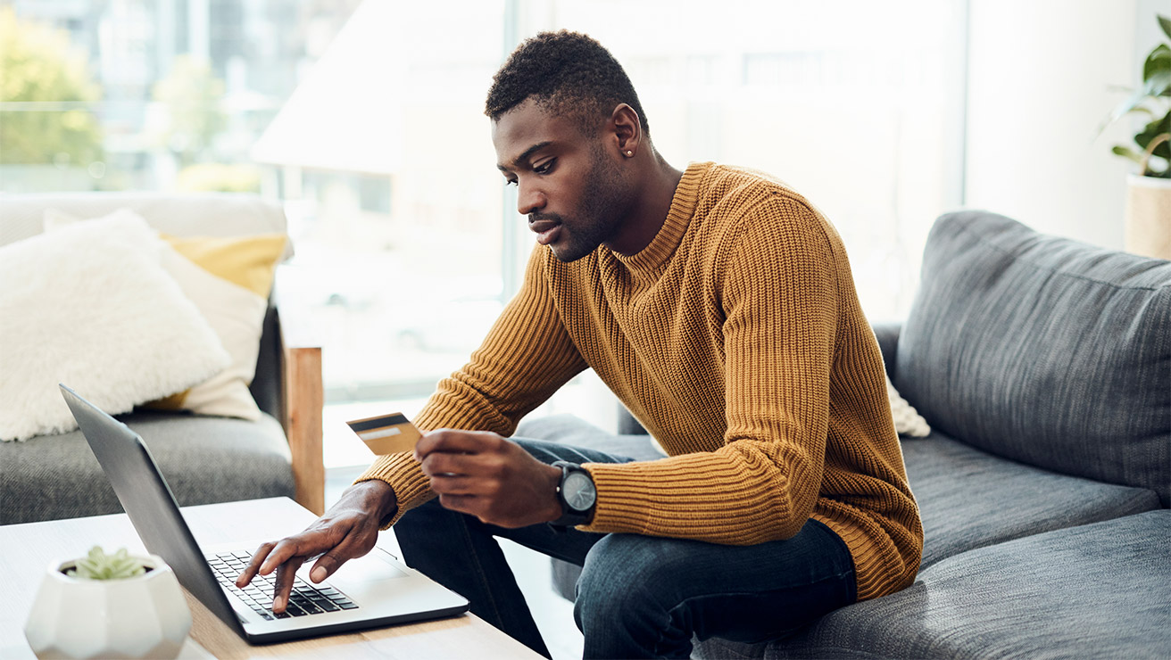 Male purchasing online using a credit card