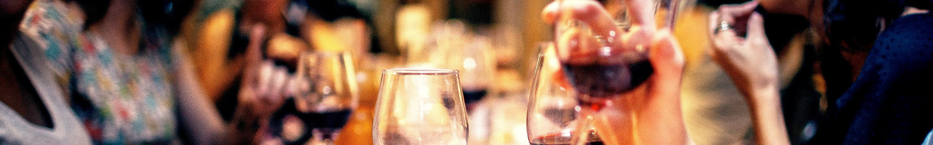 Group of friend drinking wine at restaurant table