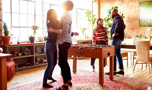 Young couples celebrating owning their own home