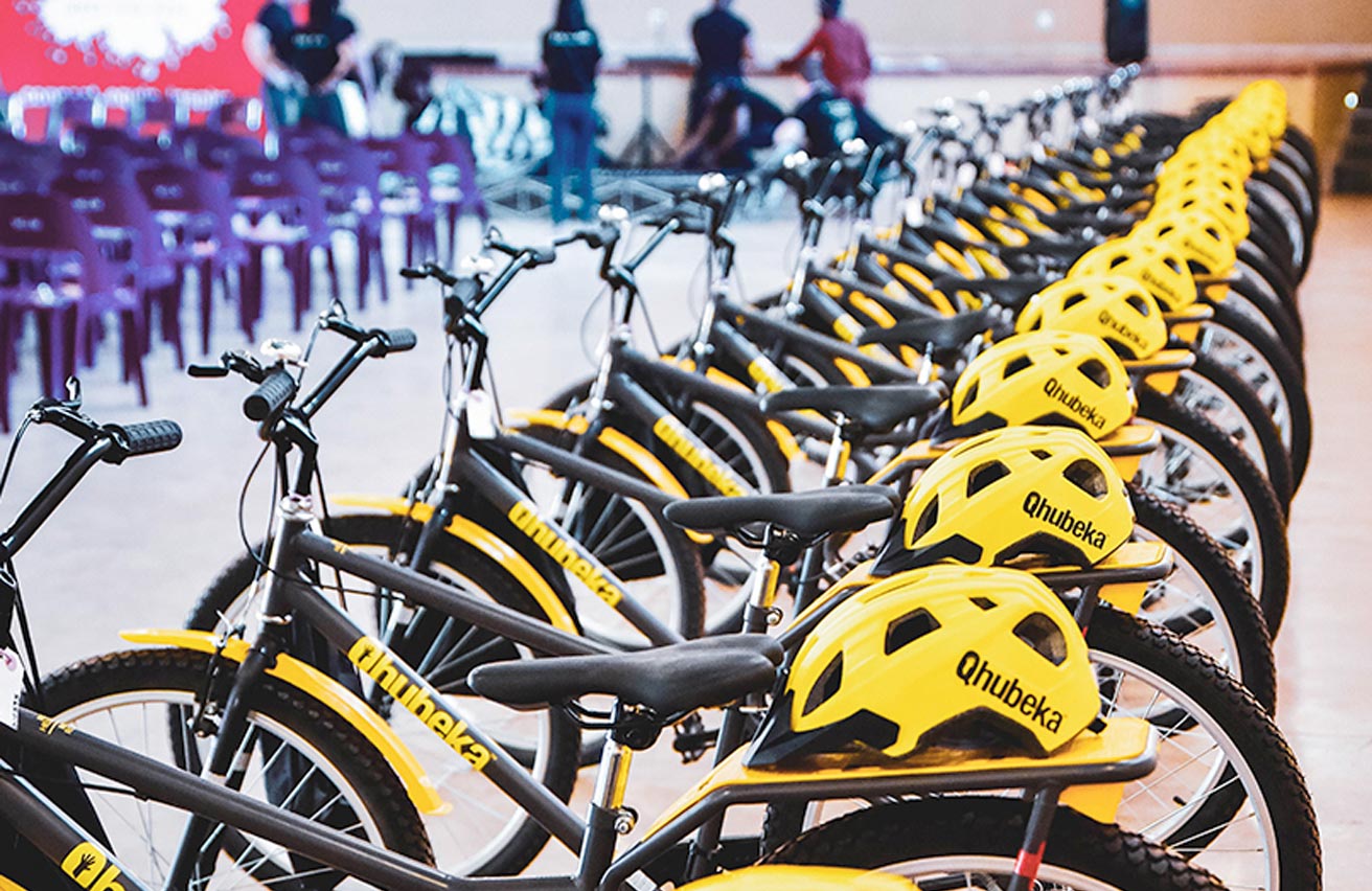 Qhubeka is a global charity that moves people forward with bicycles in Africa