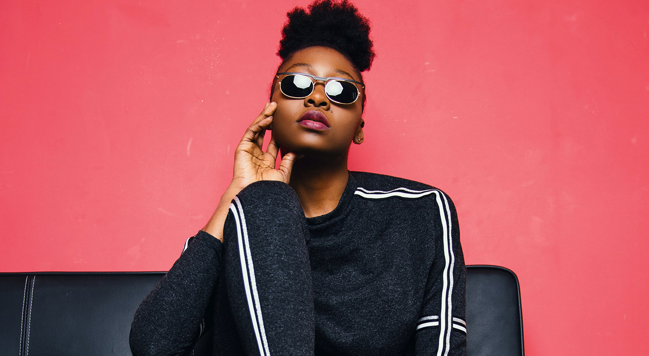 Woman posing with shades on