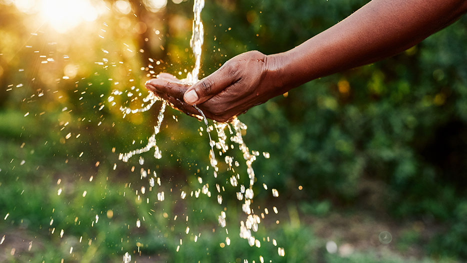 Hand under running water