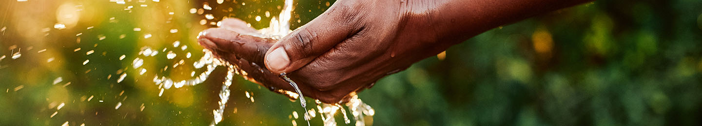 Hand under running water