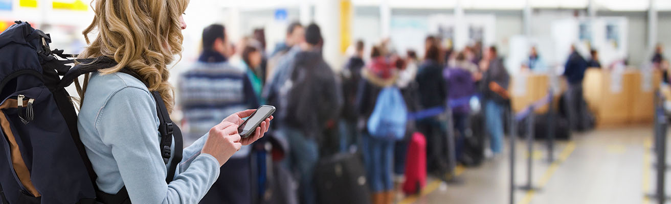 Woman standing in an airport que