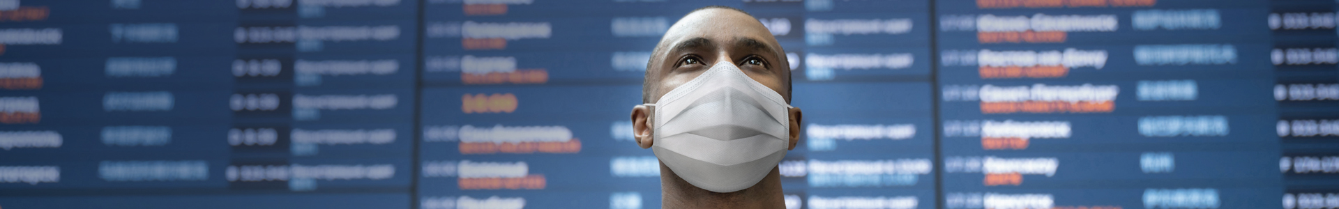 Passenger wearing a mask at airport
