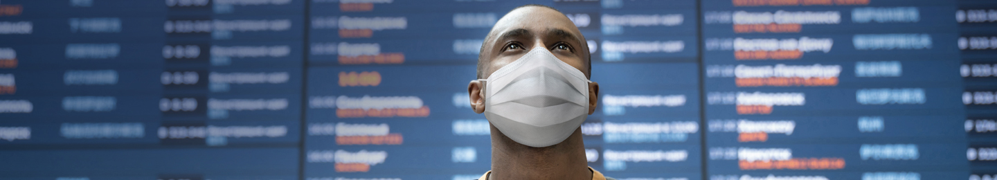 Passenger wearing a mask at airport