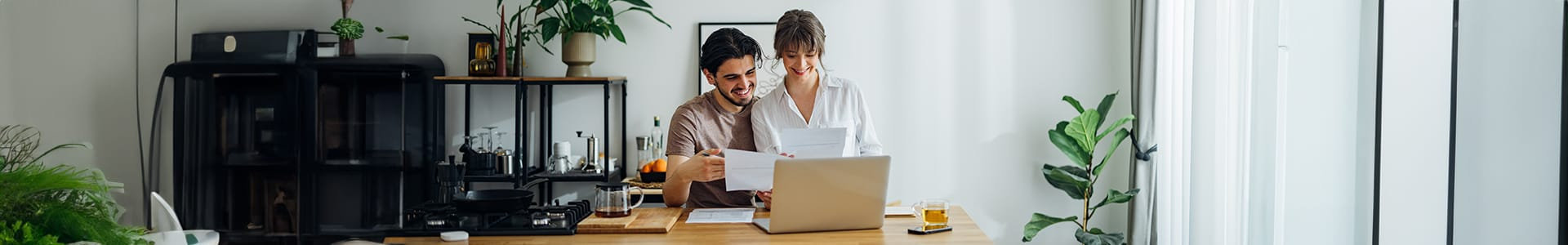 Couple sitting together at a desk