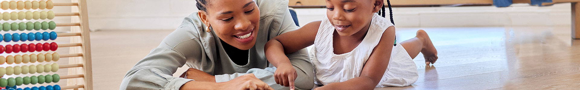 Mother and daughter calculating savings