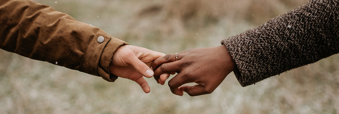 Couple holding hands