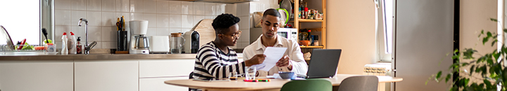 Tax | couple working on their tax submission
