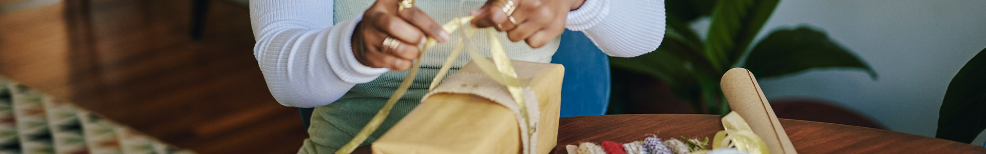 Female wrapping a present