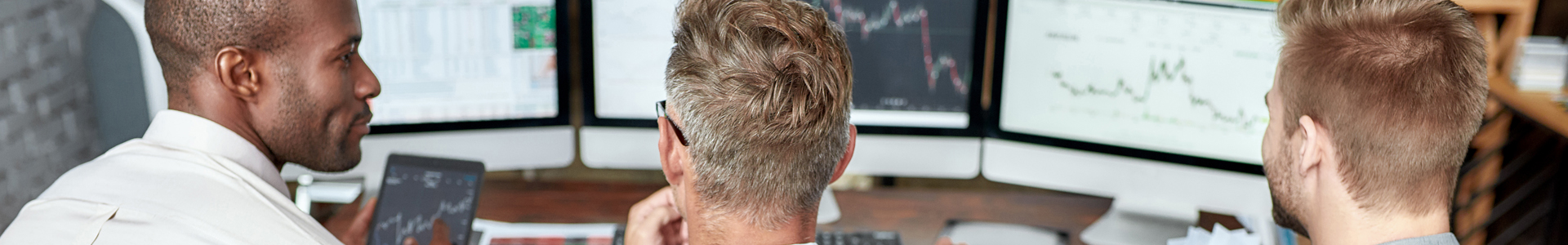 South African investors sitting at a trading desk