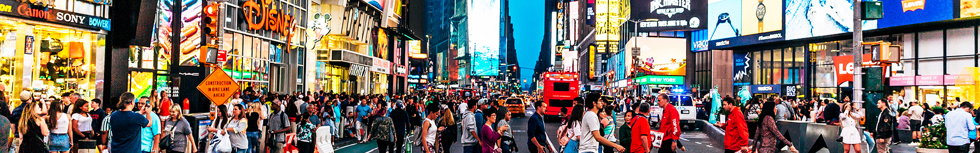 People shopping at Times Square in New York at night