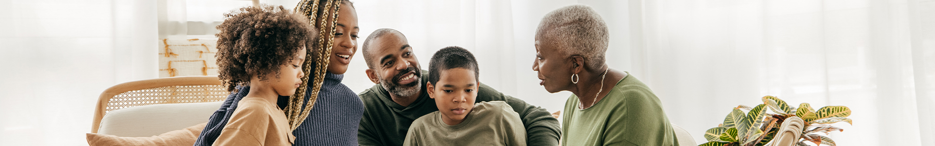 Family looking at documents together with a professional