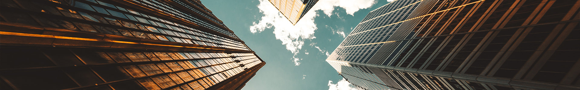 A bottom up view of city skyscrapers