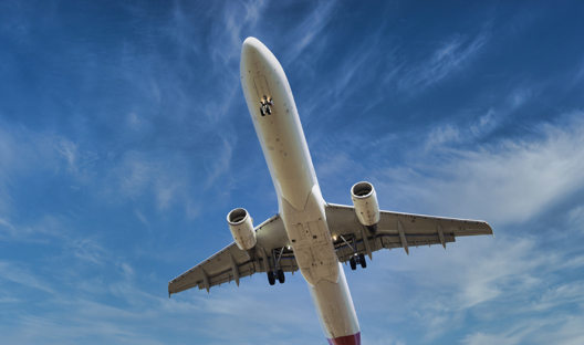 Underside of airplane flying