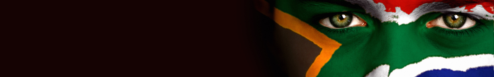 Face painted with the South African flag