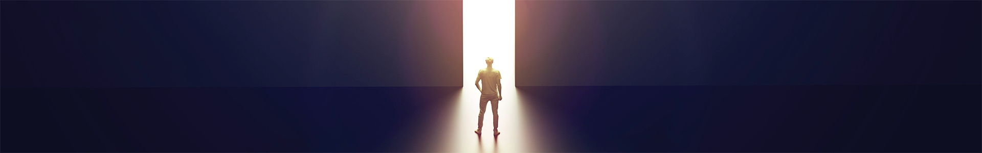 Man standing in front of open door