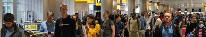 Travellers queue in UK airport