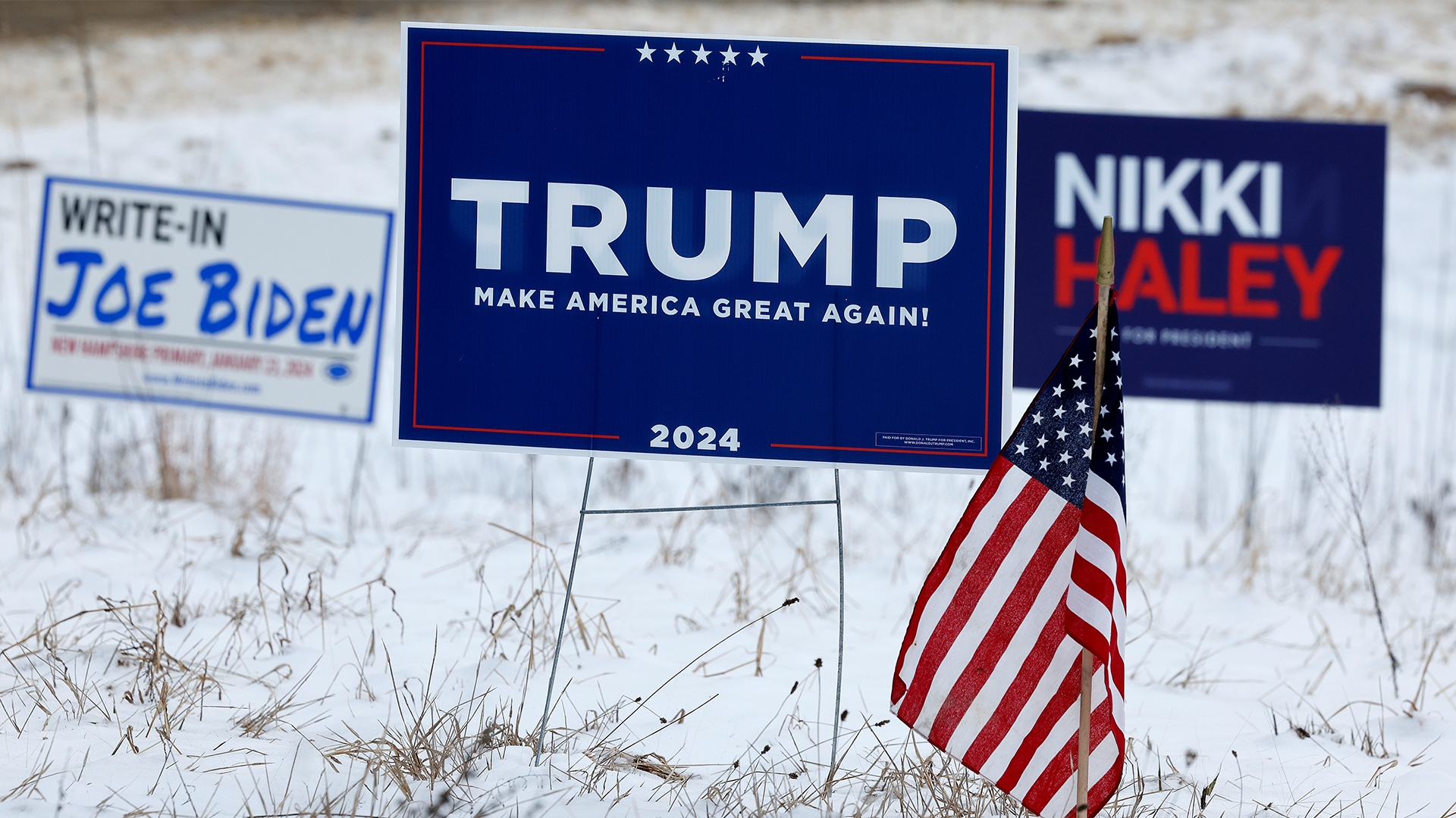 Campaign signs for Republican presidential candidates former President Donald Trump