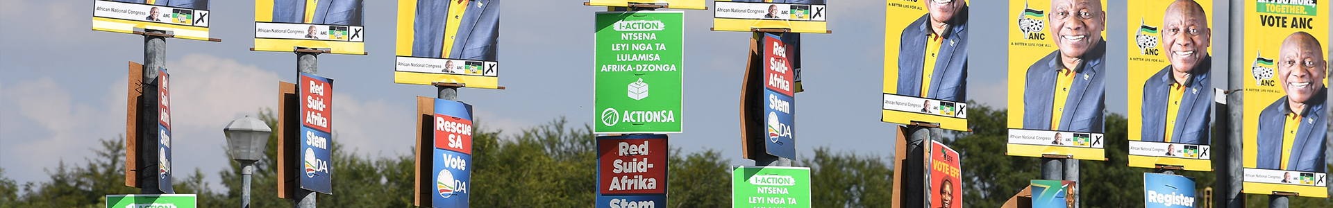 Election candidate voting posters pinned to lamp posts