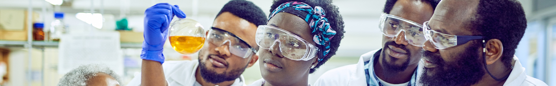 Shot of a group of scientists working together in a lab